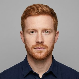 Uploaded photo 1: an AI-generated, fictional adult